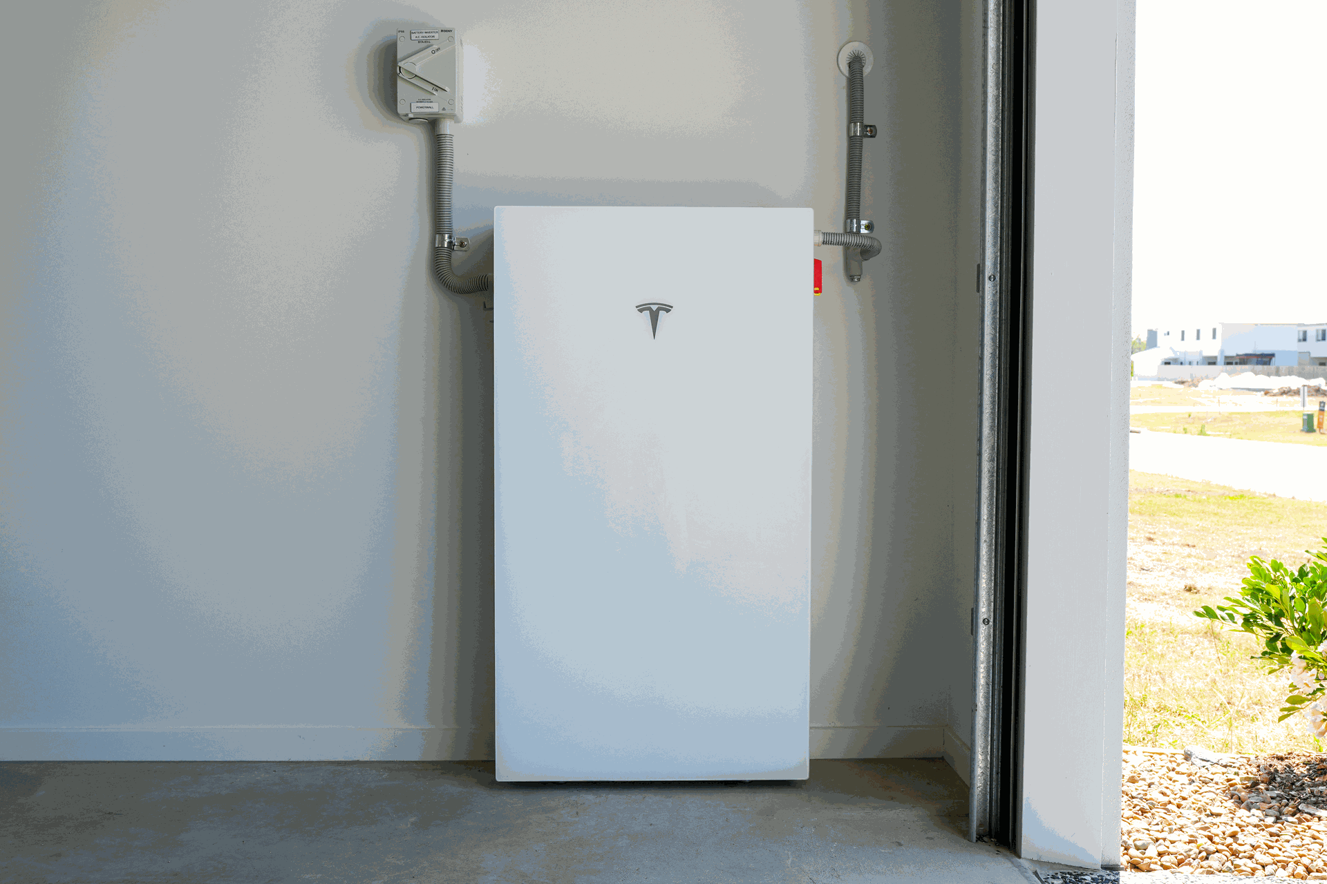 Tesla Powerwall 3 battery installed at a home Tesla Powerwall 3 battery installed at a home